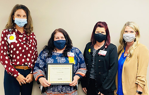 Heather Schmiegelow, HIPAA Campus Coordinator and UAMS Privacy Officer, together with her team nominated Cara Kirby, RHIA, as the 2021 HIPAA Compliance Champion.